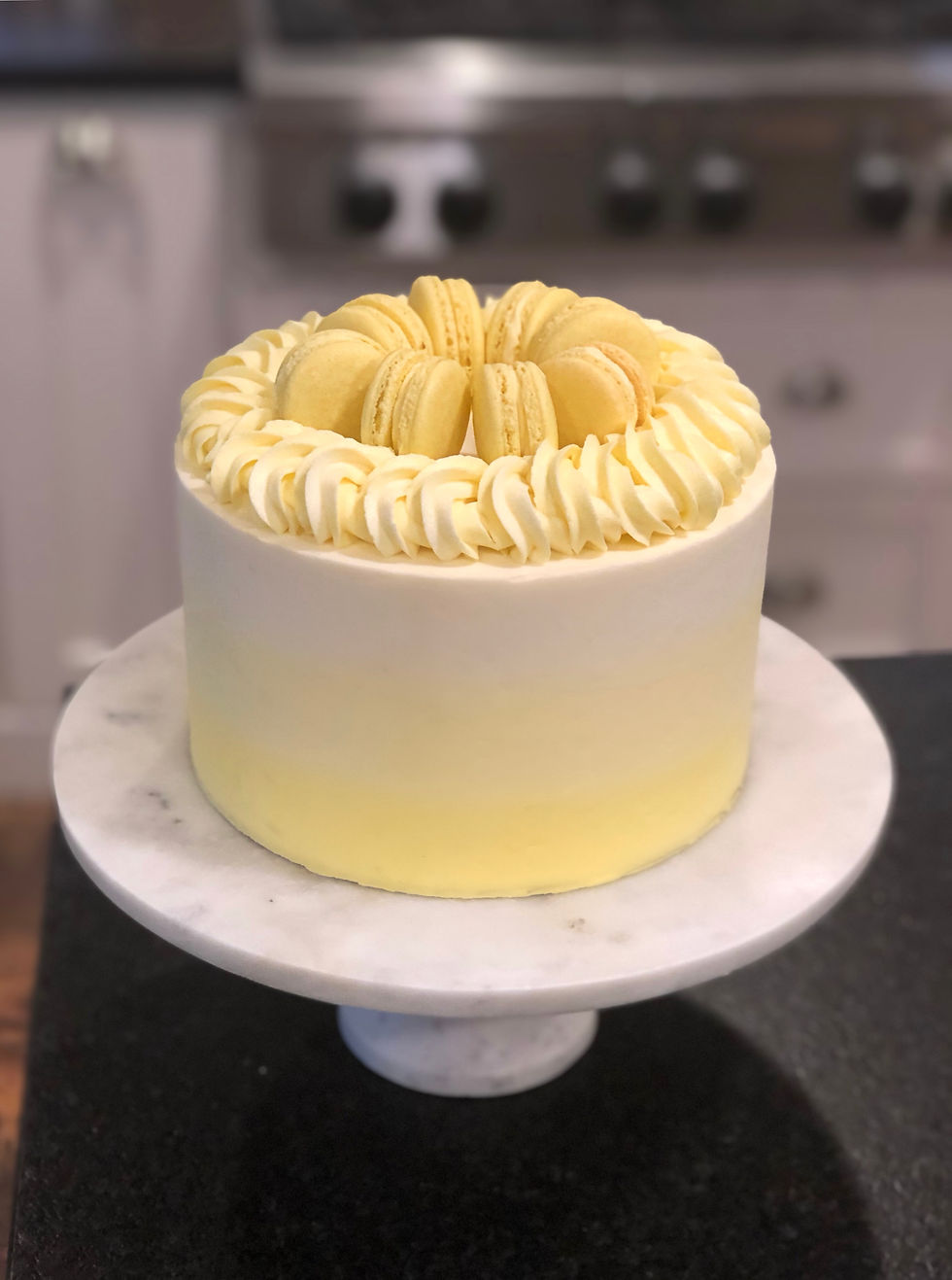 Ombre cake with rope boarder and macarons