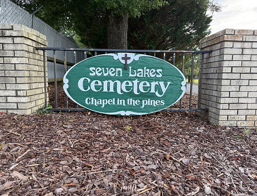seven lakes cemetery sign