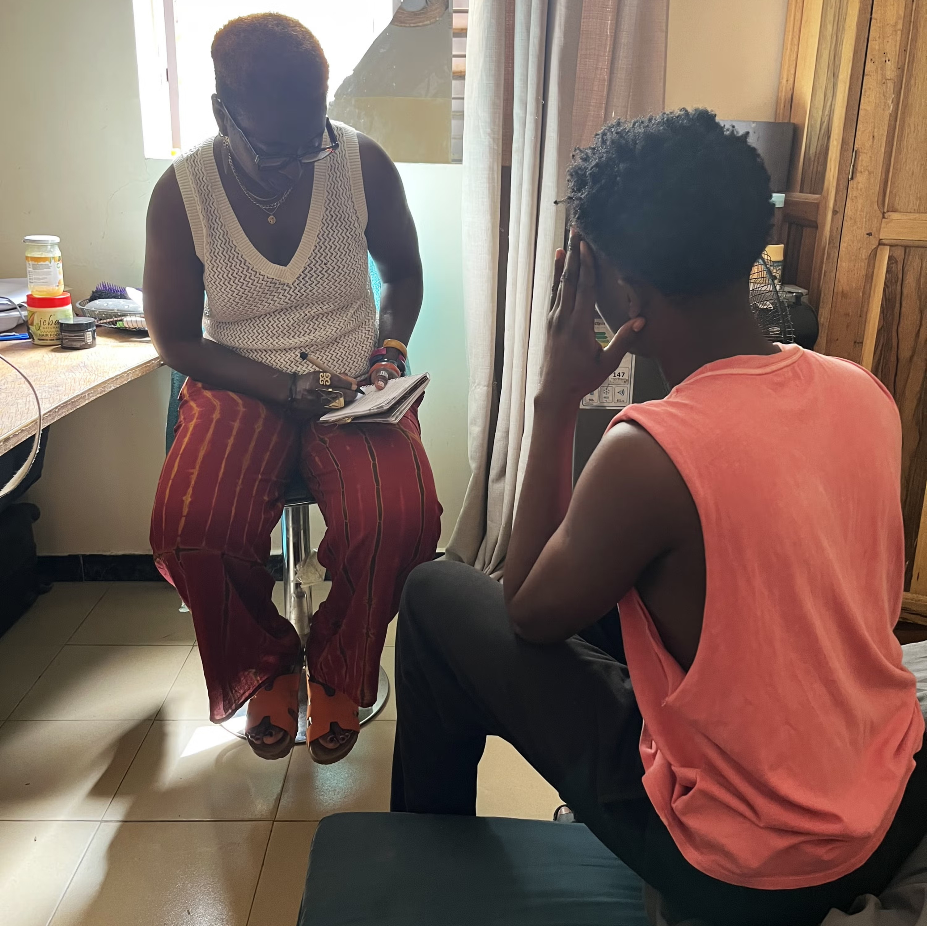 A university student in Dakar, Senegal, who has barely left his room since February due to stigma and fear of arrest, May 2026 [Image credit: Human Rights Watch]