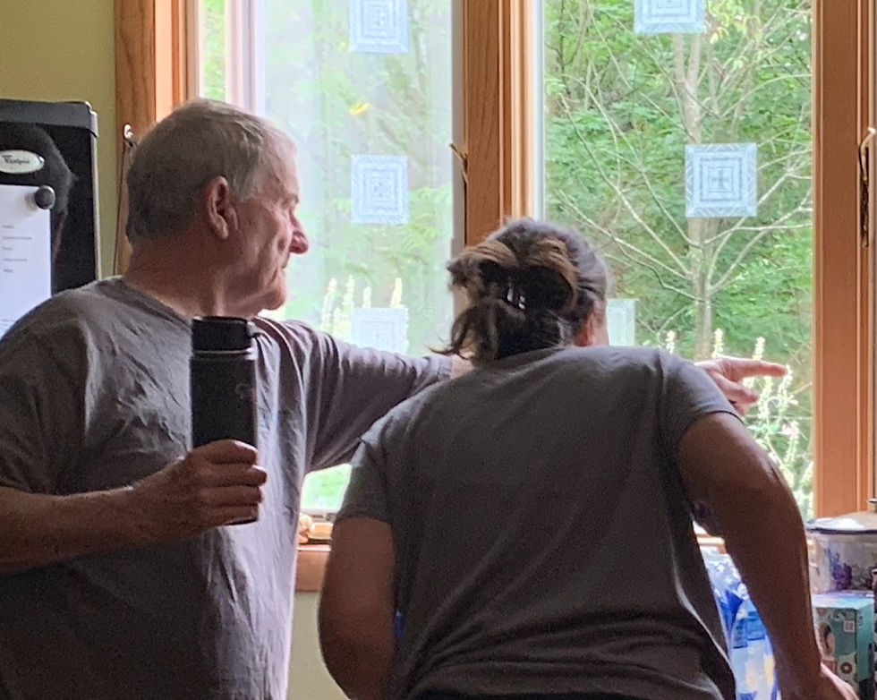 Jimmy and his daughter Jaymie watching hummingbirds and monarch butterflies from our kitchen window
