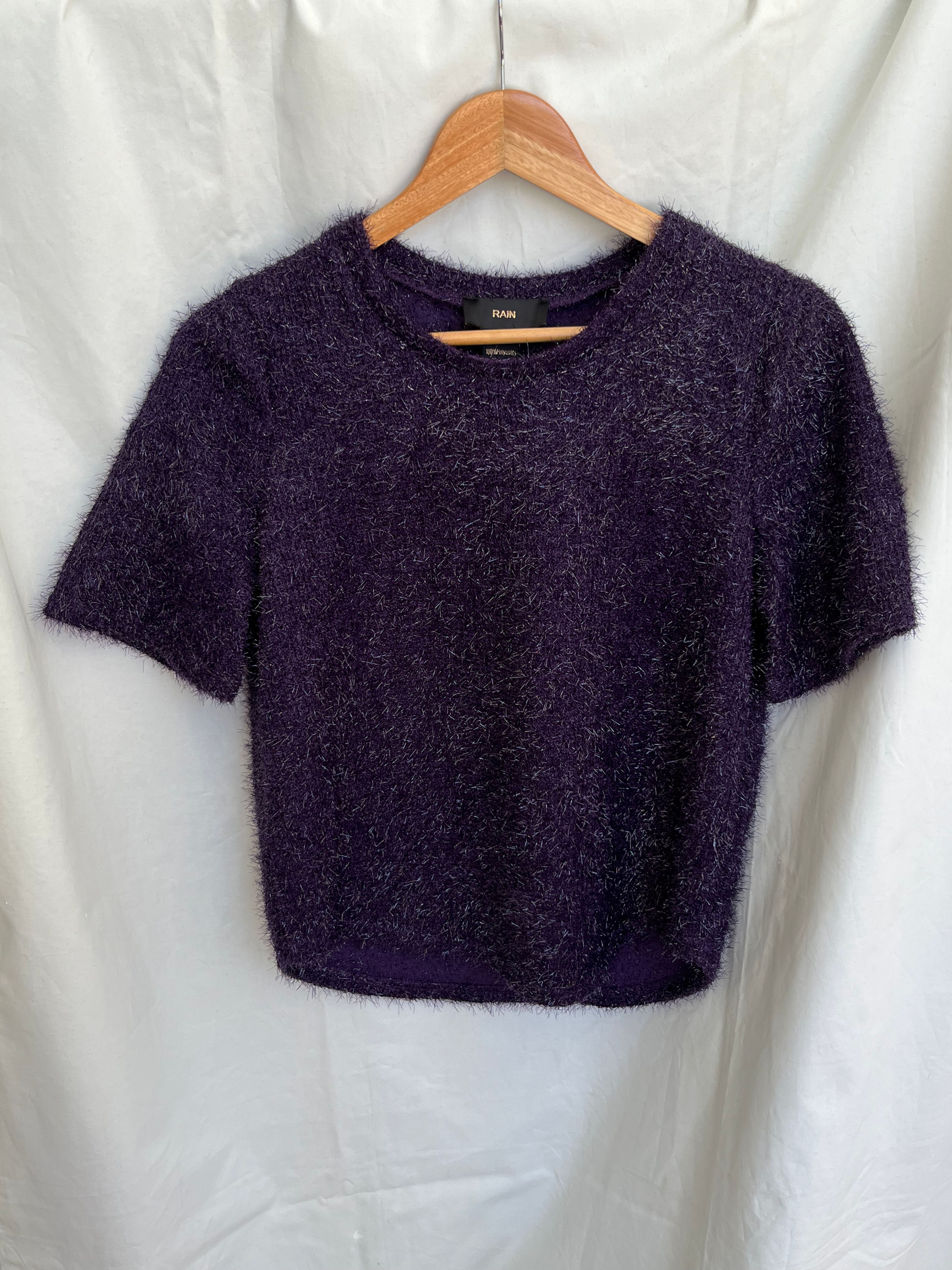 Blusa tejido pelos brillantes morado