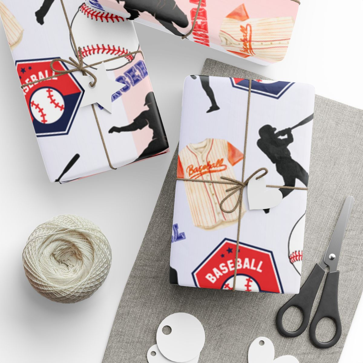 Baseball-themed wrapping paper with red stitching design