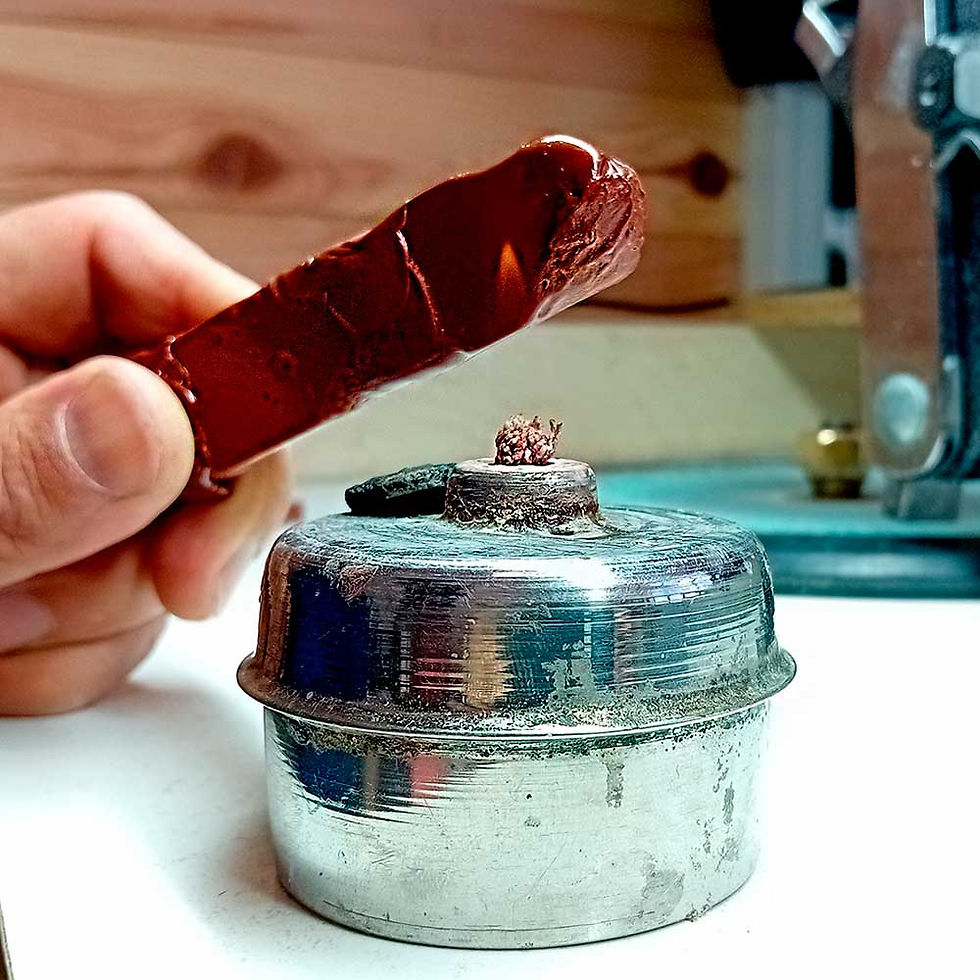 Heating the dopping wax with the alcohol burner