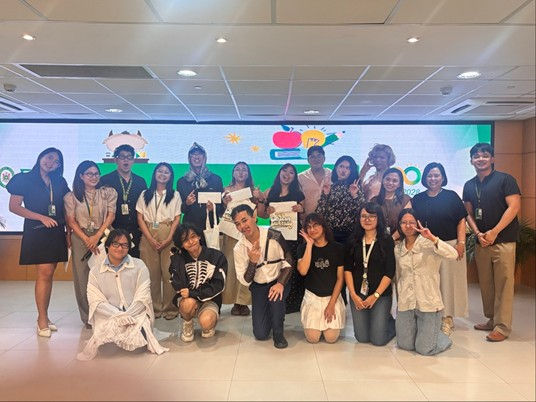 Dr. Maria Teresa Trinidad P. Tinio, SVPAA, (standing, second from right) together with faculty from the Institute of Education and student participants of “Metamorphosis: Stories for Life” storytelling event in the UCC.