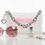 Thumbnail: Pink Beaded Handbag On A White Background Displayed With Sunglasses
