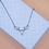 Thumbnail: Sterling Silver Reindeer Moonstone Necklace