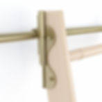 Close up detail of the Quiet Glide Rail Hook Ladder Hardware Kit, in polished brass.