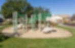 A sand surface playground that is not compliant. California playground.