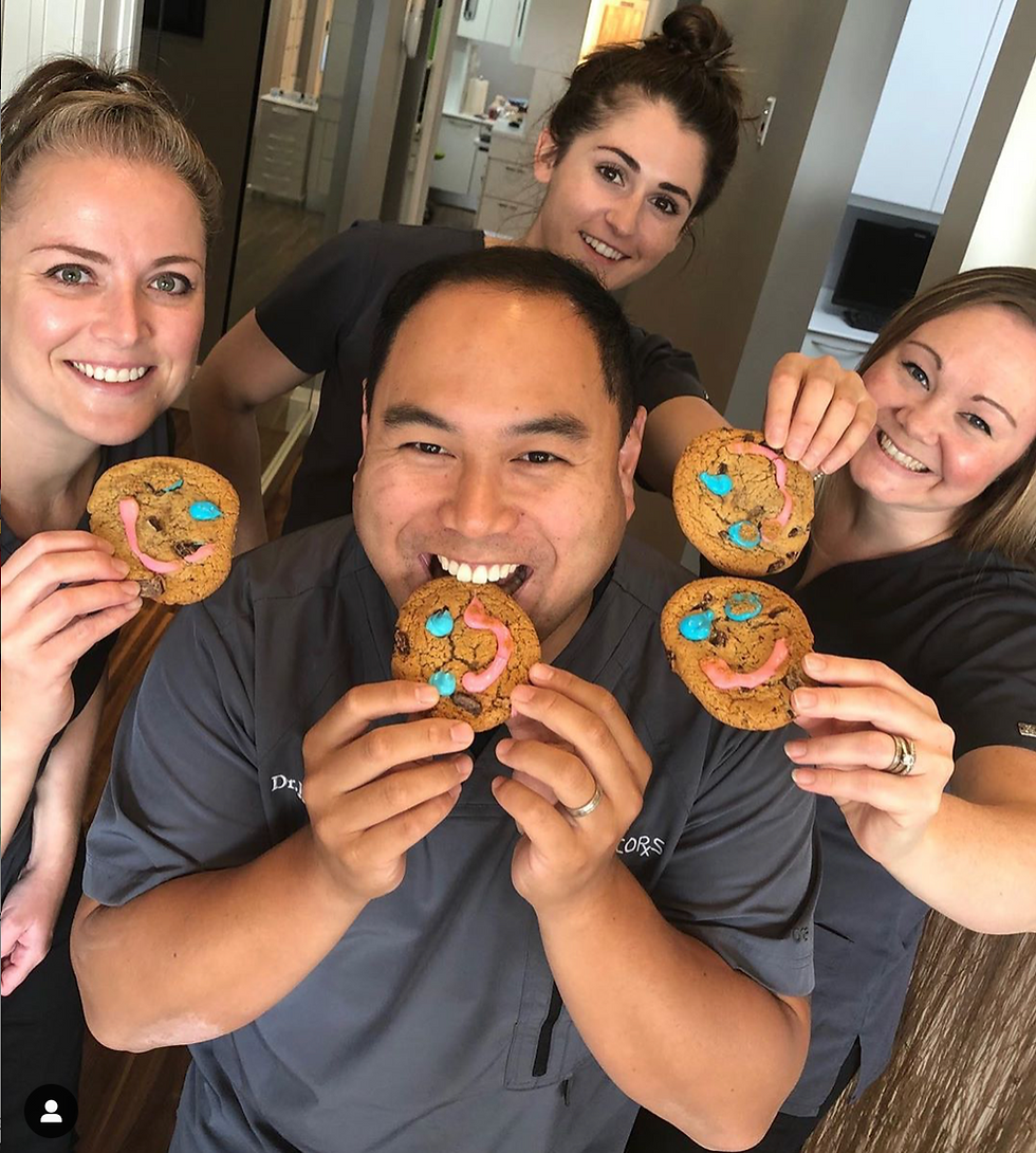 The team is eating smile cookies