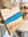 This is a picture of a custome made, one-of a kind, live-edge, River Slab Custom Woodworking