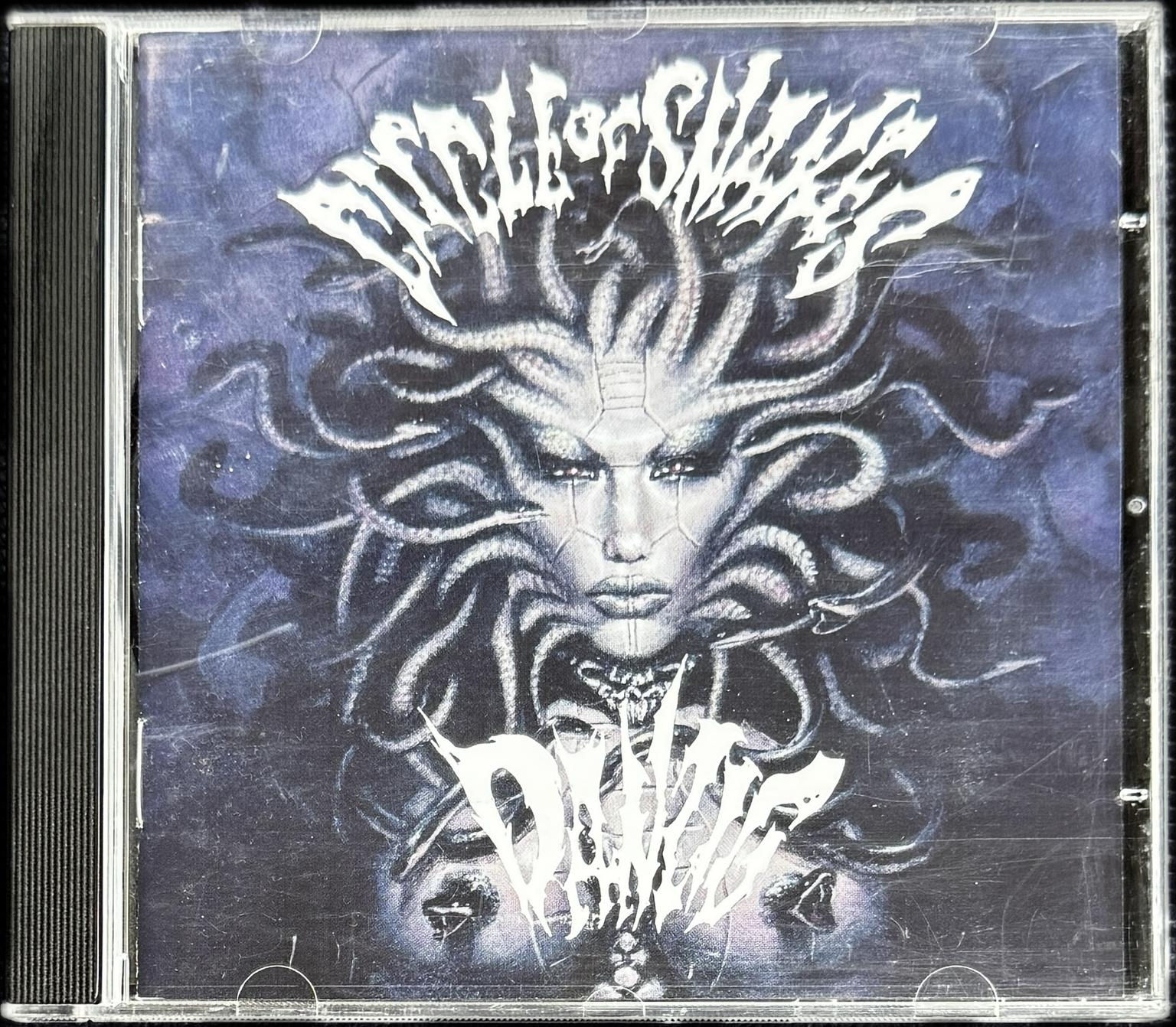 Front cover of Danzig’s Circle of Snakes 2004 Sweden pressing, featuring snake-themed artwork with a medusa-like figure