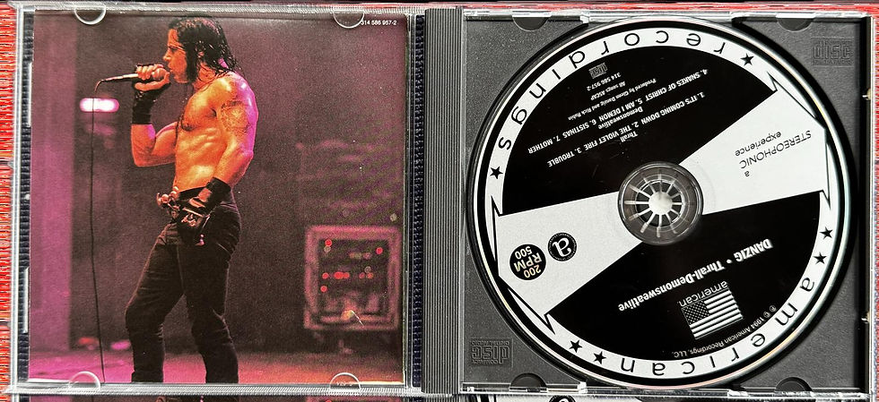 Thumbnail: Open jewel case of Danzig’s Thrall-Demonsweatlive CD EP US pressing, showing CD label and interior booklet
