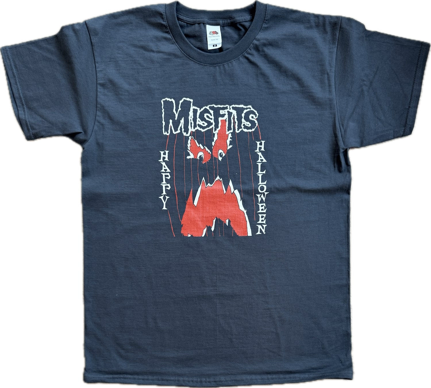 Black Misfits T-shirt with red and white screen print showing a jagged-faced pumpkin graphic. Text reads “Misfits – Happy Halloween”.