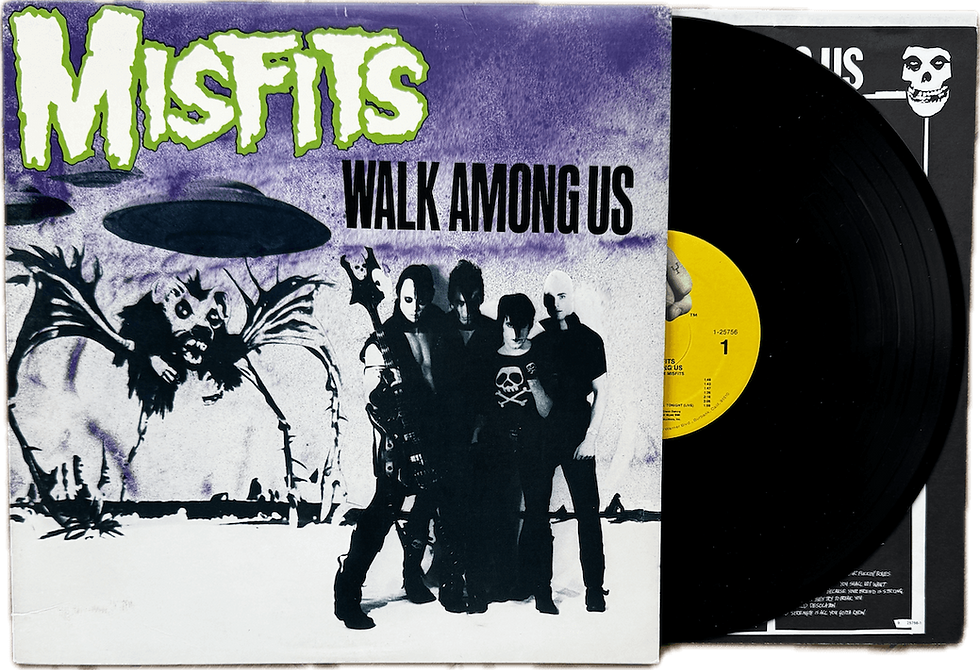 Front cover of Misfits’ Walk Among Us 1988 US reissue, featuring purple and green UFO-themed artwork with black vinyl partially visible and yellow label