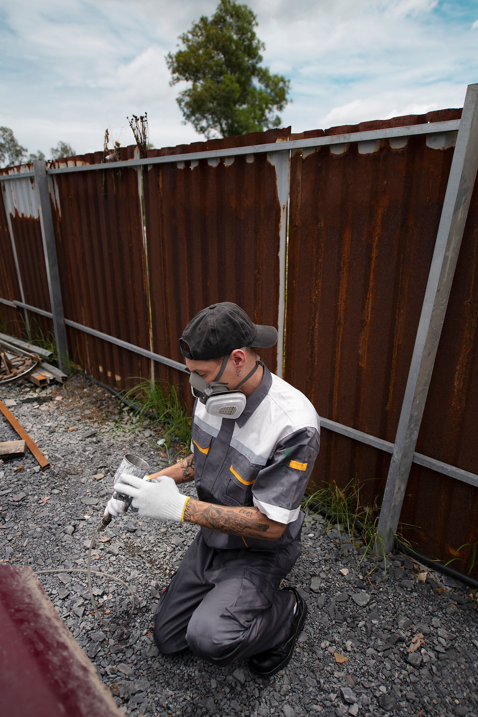 full-shot-man-spraying-powder-paint.jpg