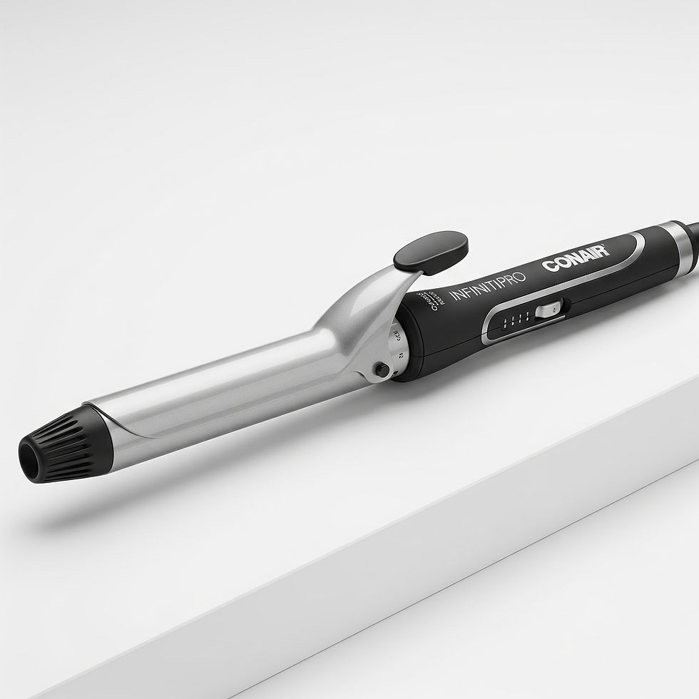 Silver and black curling iron on a white surface. Text reads "Conair" and "Infiniti Pro." Sleek design with a matte finish.
