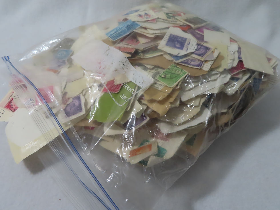 Assortment US and international postage stamps for DIY projects