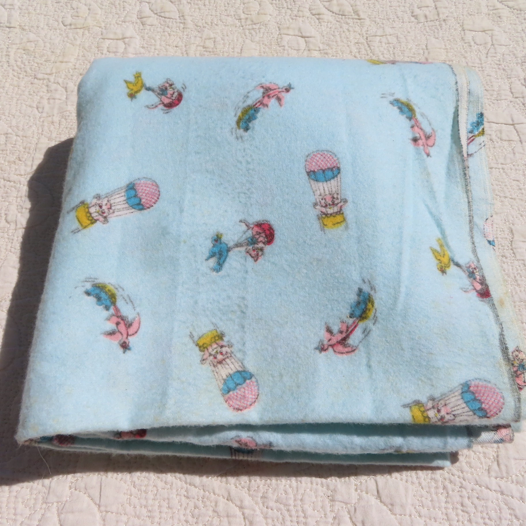 Vintage flannel fabric with birds carrying small kwaii animals