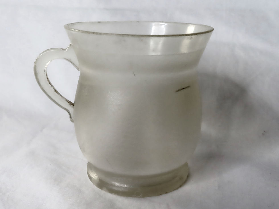 Close up face on vintage Kool Aid hard plastic mug or cup