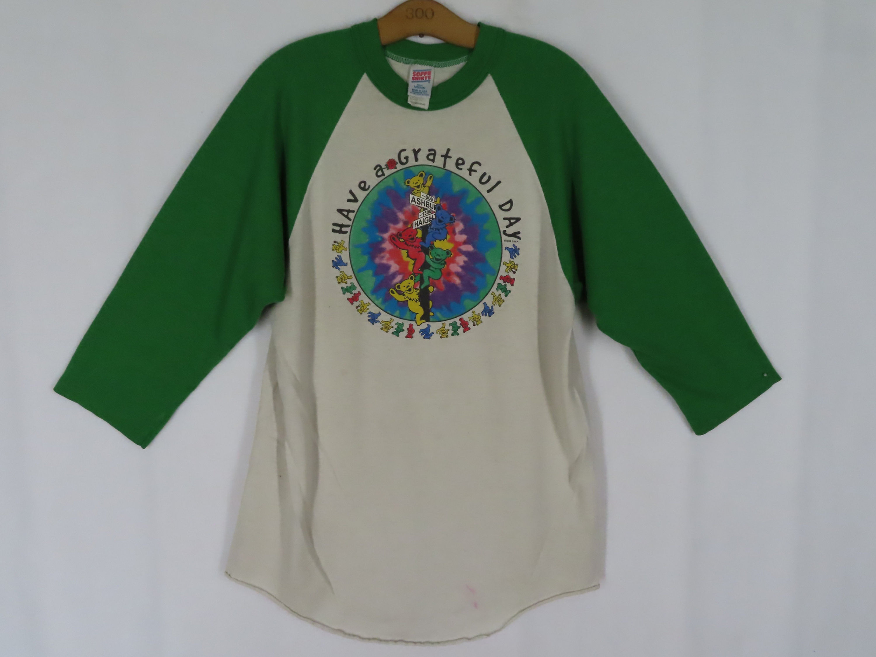 Green and white baseball tee with Grateful Dead graphic center front