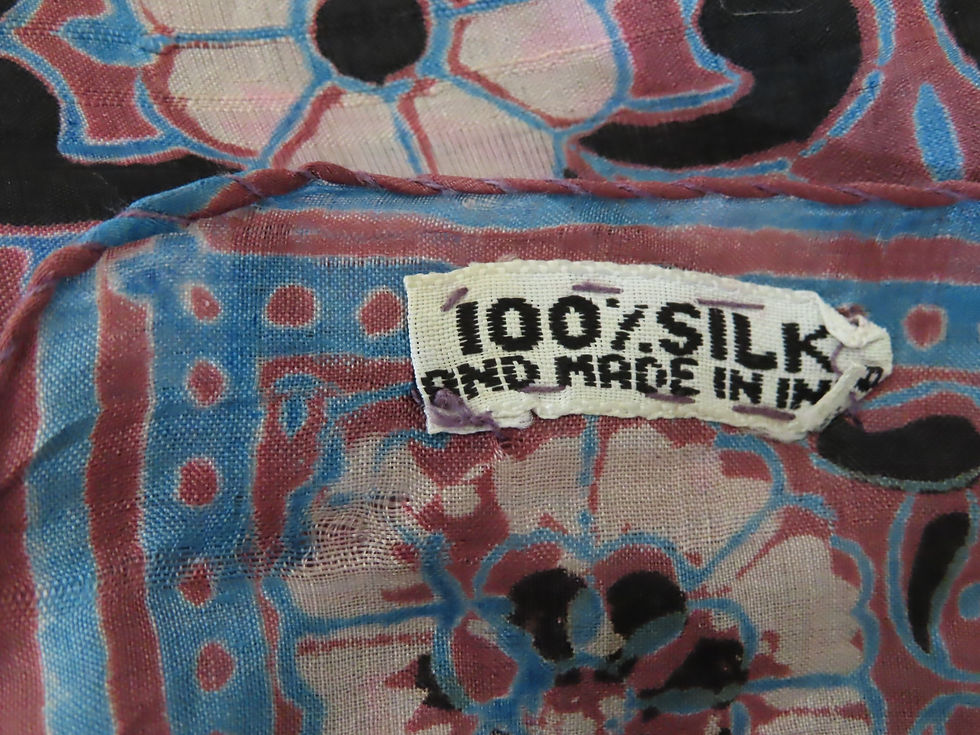 Thumbnail: Label on scarf says 'made in India'
