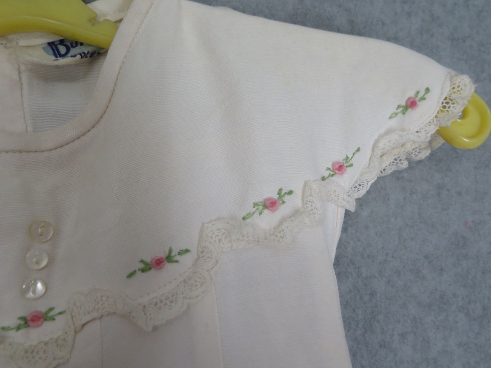 Thumbnail: Closeup embroidery on large yoke on baby dress