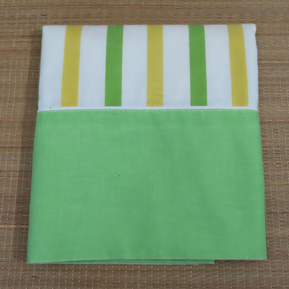 Vintage pillowcase with white, yellow and green stripes & olid green end.