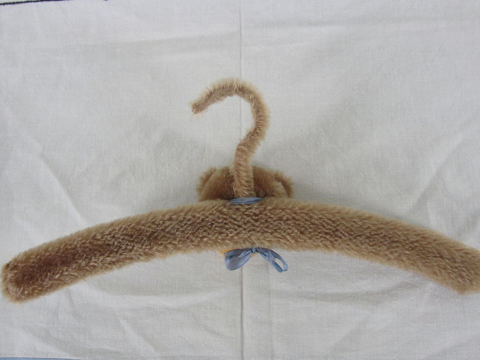 Thumbnail: Back view light brown clothes hanger covered with wool mohair