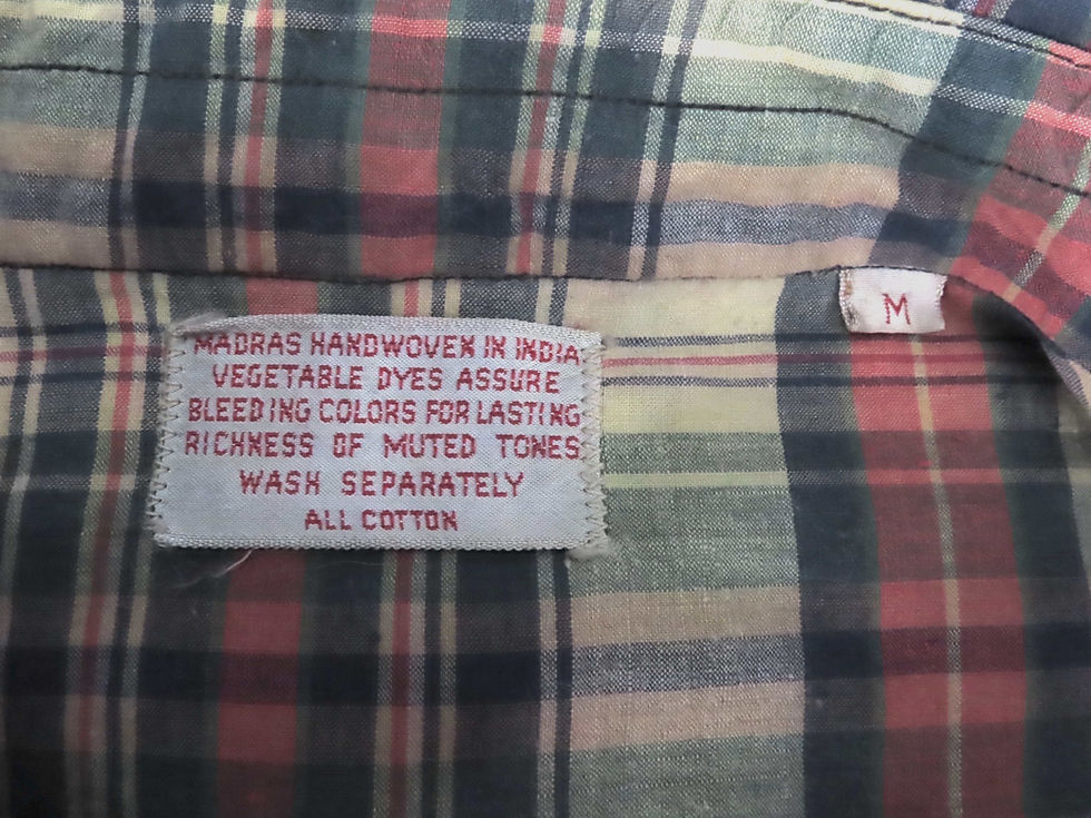 Thumbnail: vintage care label on plaid fabric