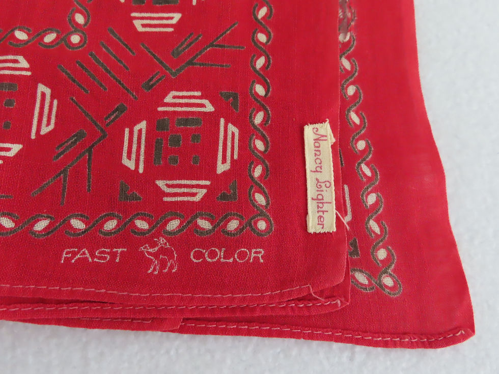 Thumbnail: Antique red bandana with brand logo showing a camel in the corner