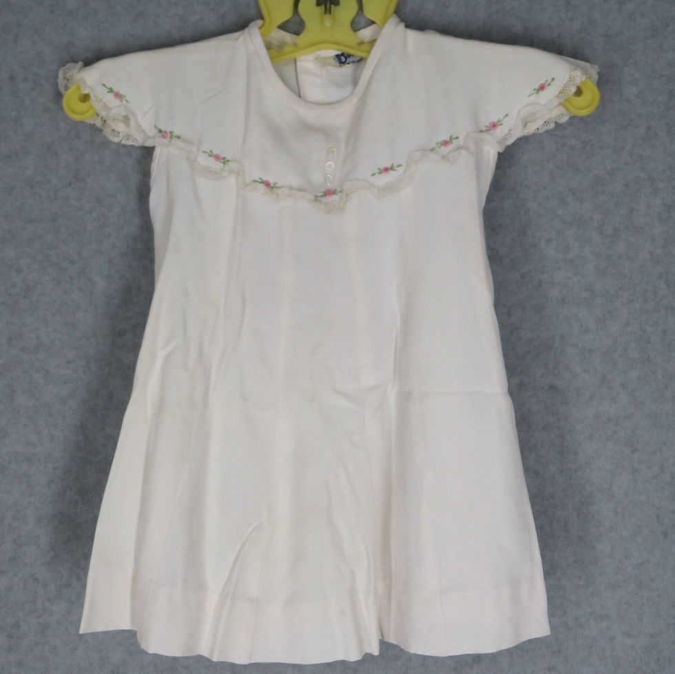 Ivory colored vintage 70s baby dress with embroidery