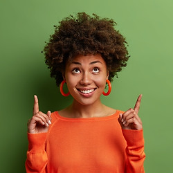 curious-pleased-dark-skinned-female-mode