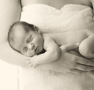 Baby in der Mutter Arme
