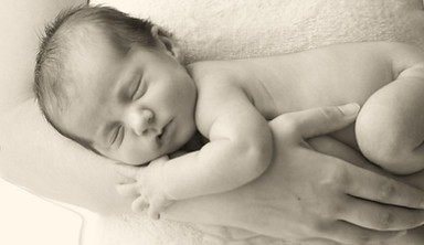 Baby in Mother's Arms