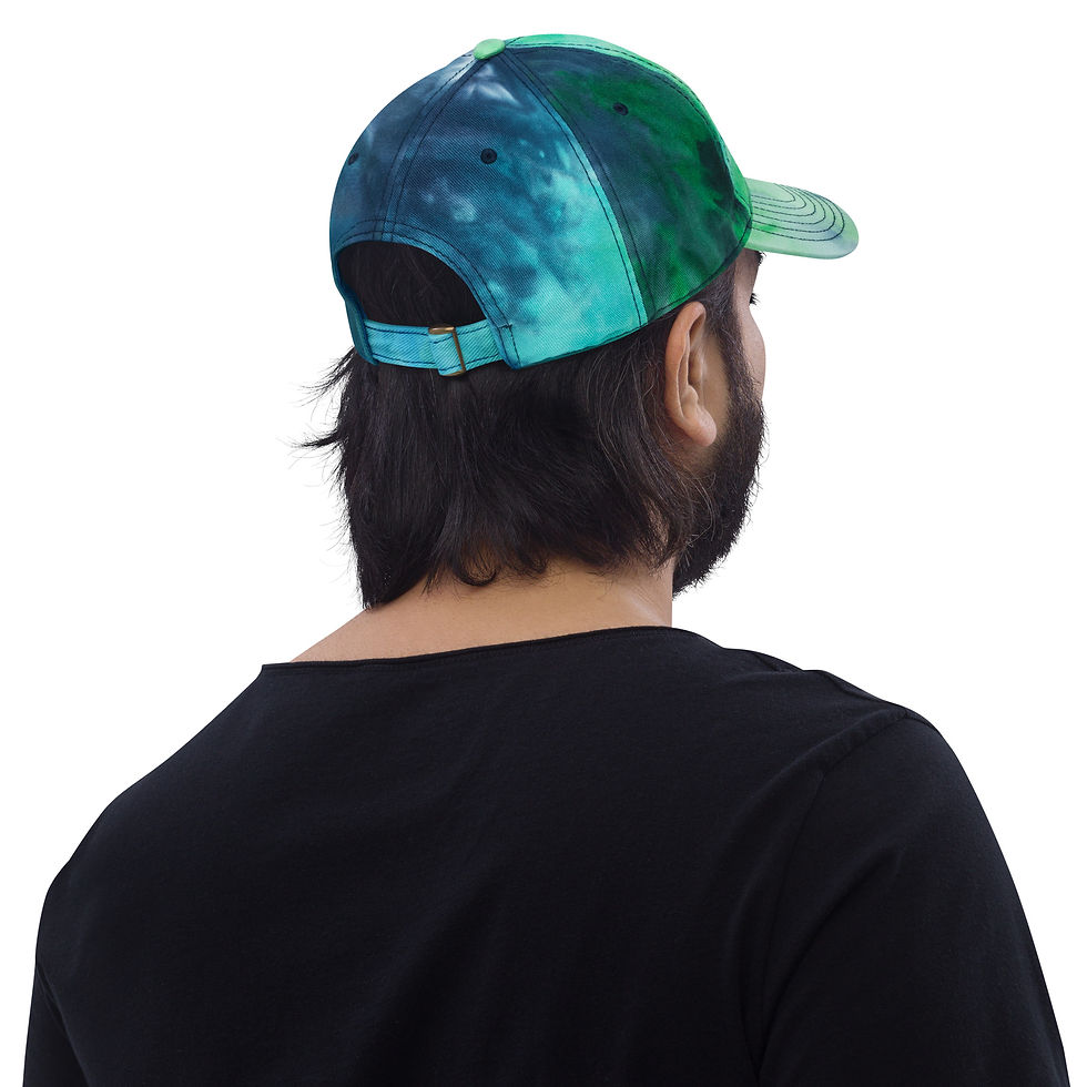 Thumbnail: Sustainable tie-dye cap modeled in outdoor setting.