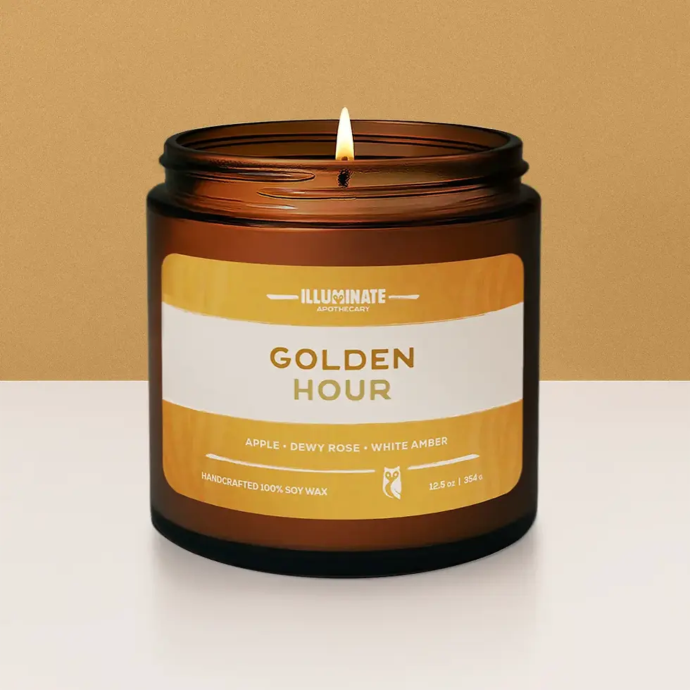 Amber glass candle with 'Golden Hour' label, lit