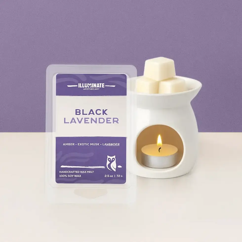 White wax warmer with lit candle, Black Lavender wax melts