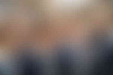 Groomsmen during ceremony smiling