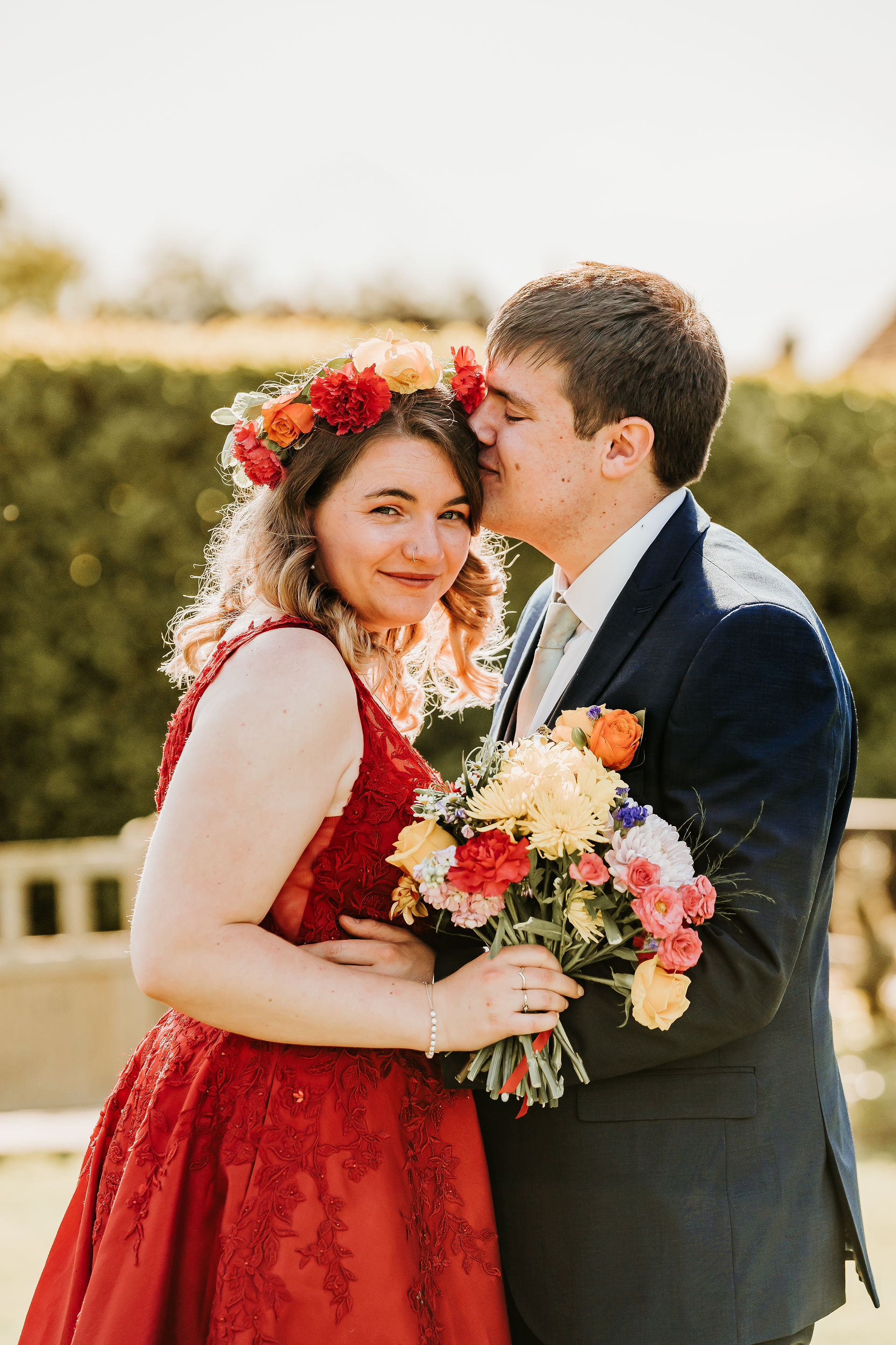Bride and Groom formal portrait with floral crown