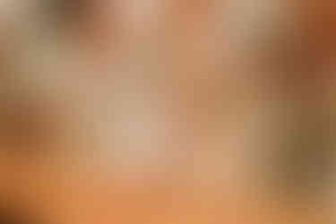 Flower girl in the church smiling at her mum