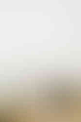 The Groom twirling his bride with the peak district in the background