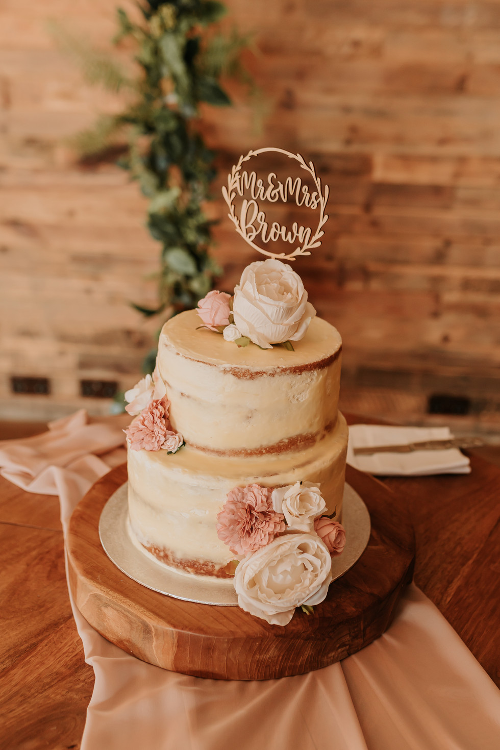 Wedding Cake on a decorative wooden table