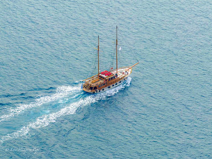 IMG_8482 - Sailboat sailing off the Santorini Port.