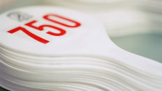 stack-of-numbered-auction-paddles