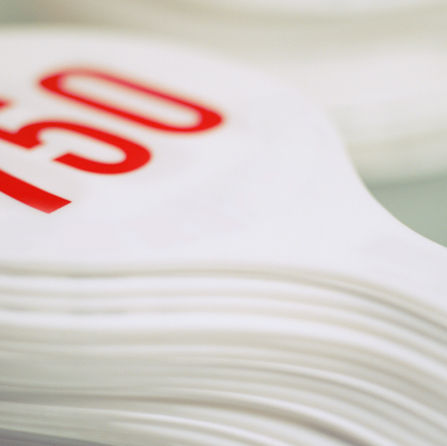 stack-of-numbered-auction-paddles