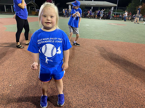 Player - Blue Shirt at Night Game Smiling at Shortstop Left.JPEG