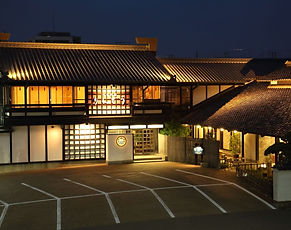 A refined kaiseki restaurant offering seasonal delicacies in a tranquil countryside setting.