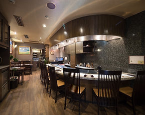 A renowned steakhouse offering premium Kobe beef prepared with precision in an elegant and refined setting.