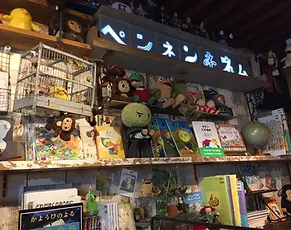 Picture book café in Osaka providing a warm escape with nostalgic charm, handmade sweets, and carefully curated shelves.