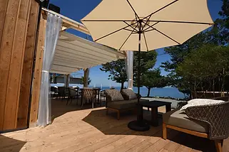 A peaceful lakeside café on Lake Biwa's northern shore serving specialty coffee, seasonal sweets, and tranquil terrace views of the water.